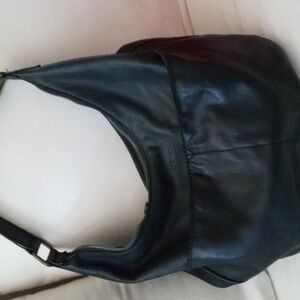 A black American Leather Co bag. The width  15 " X  9 1/2".